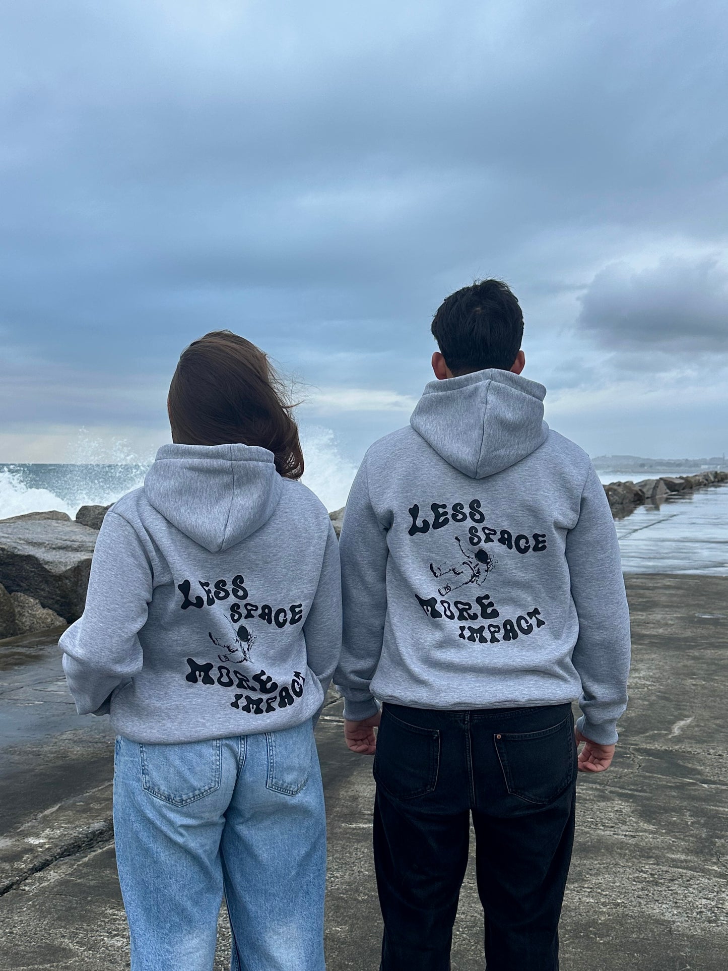 Hoodie “Less Space, More Impact.”