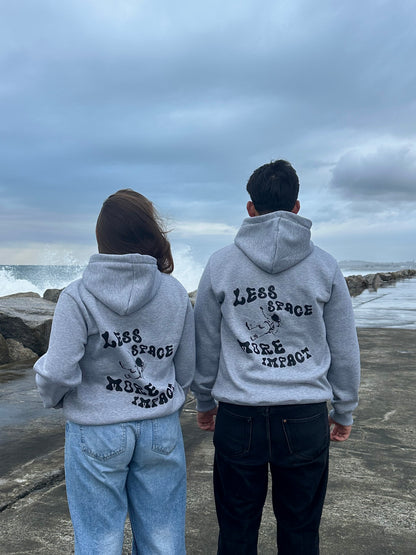 Hoodie “Less Space, More Impact.”