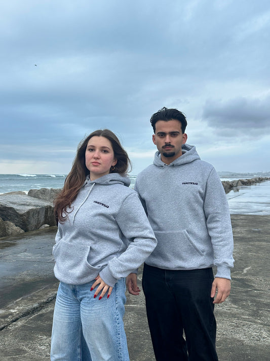 Hoodie “Less Space, More Impact.”