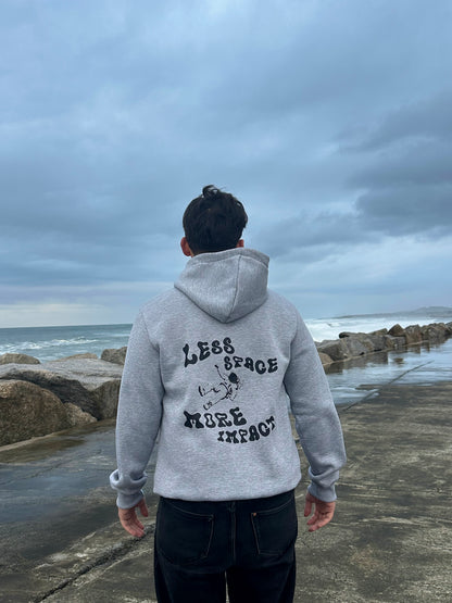 Hoodie “Less Space, More Impact.”